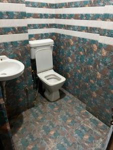 Ένα μπάνιο στο Hotel Shiv Mahima