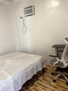 Galería fotográfica de Bayay Tayuha 2BR island work home WiFi with UPS en General Luna 9 fotos más