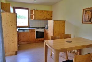 Kuchyň nebo kuchyňský kout v ubytování Natur Ferienpark 33 - App E