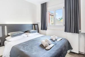 Кровать или кровати в номере Delta City Hotels