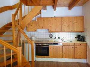 Kuchyň nebo kuchyňský kout v ubytování Natur Ferienpark 15 - Typ B