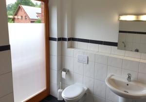 Koupelna v ubytování Natur Ferienpark 32 - App D + 5 fotografií