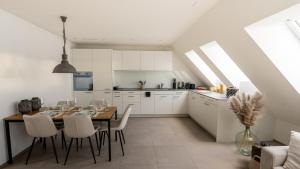 Η κουζίνα ή μικρή κουζίνα στο Modern apartment next to Zurich HB with roof terrace