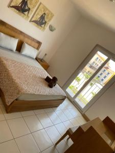 Ένα ή περισσότερα κρεβάτια σε δωμάτιο στο condomínio vila verde Pepper, Cactus T0,T1,T3 +50 φωτογραφίες