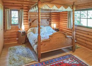 Postel nebo postele na pokoji v ubytování Loch Shuna Lodges