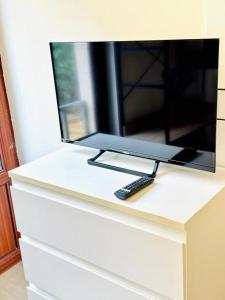 Μια τηλεόραση ή/και κέντρο ψυχαγωγίας στο Villa Olas y Llamas Ciudad, mar y naturaleza +23 φωτογραφίες