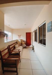 Posezení v ubytování Raízes Guest House