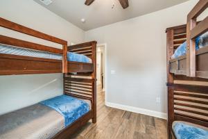 a bedroom with two bunk beds in a house at Private Dock and Yard! Modern Getaway in Mabank in Enchanted Oaks