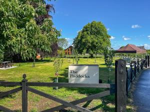 a sign for the paddocks on a fence at The Paddocks Retreat in North Thoresby