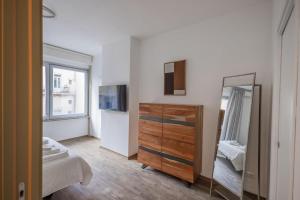 Giường trong phòng chung tại Liborio Suite