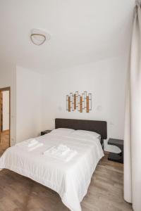 Giường trong phòng chung tại Liborio Suite