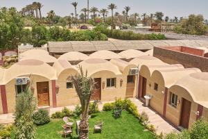 an overhead view of a school building with a courtyard at Sun Temple Palace in Cairo