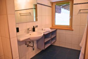 Koupelna v ubytování Haus Koller + 12 fotografií