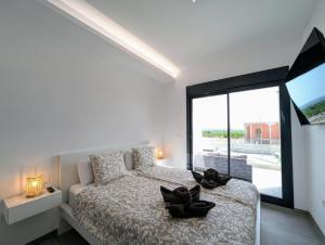 Postel nebo postele na pokoji v ubytování R-40-D Retiro exclusivo + 23 fotografií