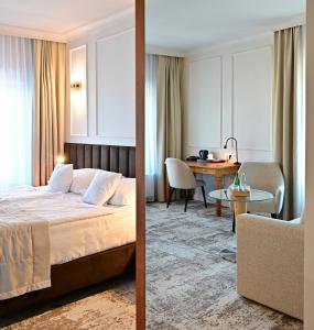 a hotel room with a bed and a desk at Hotel Piast in Opole +71 photos