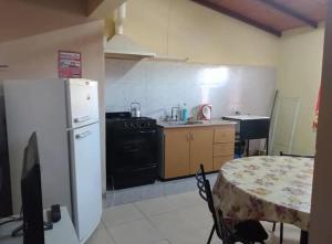 Η κουζίνα ή μικρή κουζίνα στο Departamentos Susana & Aldo