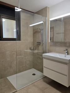 Ένα μπάνιο στο Casa Rivapiana, 1,5-Zimmerwohnung by HolAp SA +11 φωτογραφίες