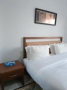 Ένα ή περισσότερα κρεβάτια σε δωμάτιο στο Ton Logement Tunis