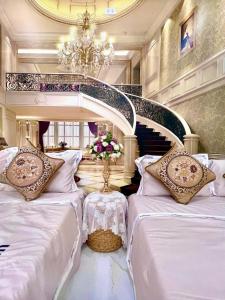 En eller flere senge i et værelse på Hoàng Nga 2 Homestay + 79 billeder