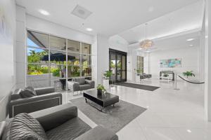 a living room with a couch and a table at Ocean Reserve 1524 in Miami Beach