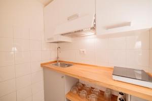 Η κουζίνα ή μικρή κουζίνα στο La Stanza del Poeta