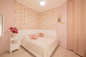 Ένα ή περισσότερα κρεβάτια σε δωμάτιο στο La Stanza del Poeta +6 φωτογραφίες