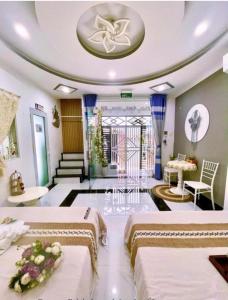 Ένα ή περισσότερα κρεβάτια σε δωμάτιο στο Hoàng Nga 2 Homestay