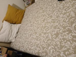 Ένα ή περισσότερα κρεβάτια σε δωμάτιο στο Les Trois Perles de Thiais