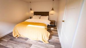 Ένα ή περισσότερα κρεβάτια σε δωμάτιο στο The Tantrum Luxury Lodge