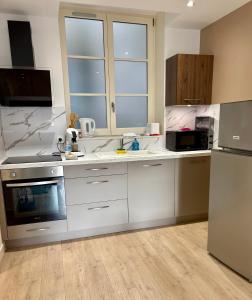 Kuchyň nebo kuchyňský kout v ubytování Le Charmant-T2 rénové-Plein centre de Limoges