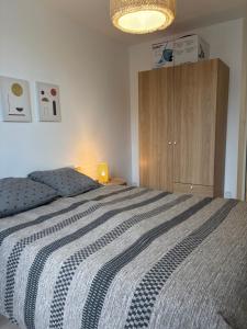 Postel nebo postele na pokoji v ubytování Le Charmant-T2 rénové-Plein centre de Limoges