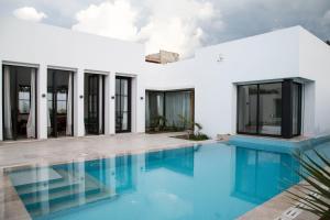 Πισίνα στο ή κοντά στο Les Verrières De Gammarth Piscine et confort