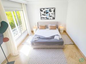 Postel nebo postele na pokoji v ubytování Villa des artistes : Villa de luxe à Carthage