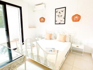 Ένα ή περισσότερα κρεβάτια σε δωμάτιο στο Residence Jannet 2 Luxury Seaside 3 bedrooms