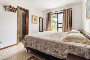 Postel nebo postele na pokoji v ubytování Chácara Privativa com Quadra de Beach Tennis + 103 fotografií