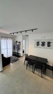 Kuchyň nebo kuchyňský kout v ubytování Apartamento inteiro com vaga, varanda e piscina