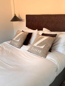 Postel nebo postele na pokoji v ubytování Indy Grab Lodge