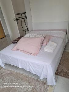 Postel nebo postele na pokoji v ubytování Apartamento Moderno no Coração de Curitiba com Conforto e Praticidade