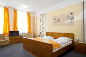 Postel nebo postele na pokoji v ubytování Hotel Neun 3/4