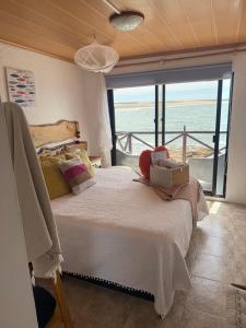 Postel nebo postele na pokoji v ubytování Posada Mariemar Cabo Polonio + 16 fotografií