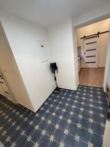 Giường trong phòng chung tại Apartmán 1879