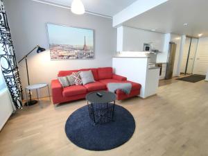 Et opholdsområde på Central Apartment for 4 with Sauna