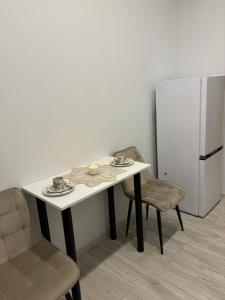 Kuchyň nebo kuchyňský kout v ubytování Vecpilsētas apartaments