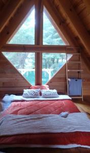 Postel nebo postele na pokoji v ubytování Cabaña Familiar + 22 fotografií