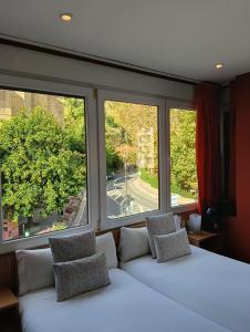 Ένα ή περισσότερα κρεβάτια σε δωμάτιο στο Ekia Pentsioa