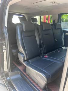 an open back seat of a car with the back seats folded at House100 in Kos Town