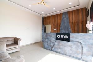 Televiisor ja/või meelelahutuskeskus majutusasutuses Hotel O AB Residency