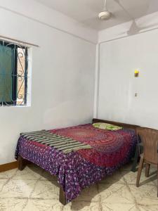 Ένα ή περισσότερα κρεβάτια σε δωμάτιο στο Messianic guest house