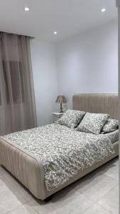 Ένα ή περισσότερα κρεβάτια σε δωμάτιο στο Dar Sammar