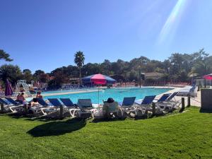 Swimmingpoolen hos eller tæt på Mobil-Home tout confort au Cap Ferret